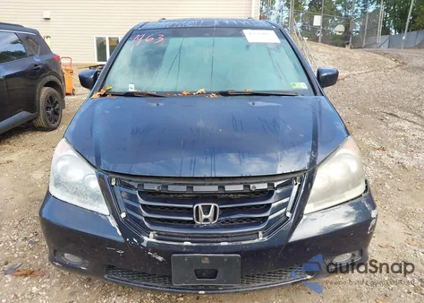 2010 Honda Odyssey Touring z USA, uszkodzony, nr VIN 5FNRL3H99AB058887